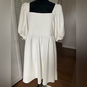 Off white dress with puff sleeves